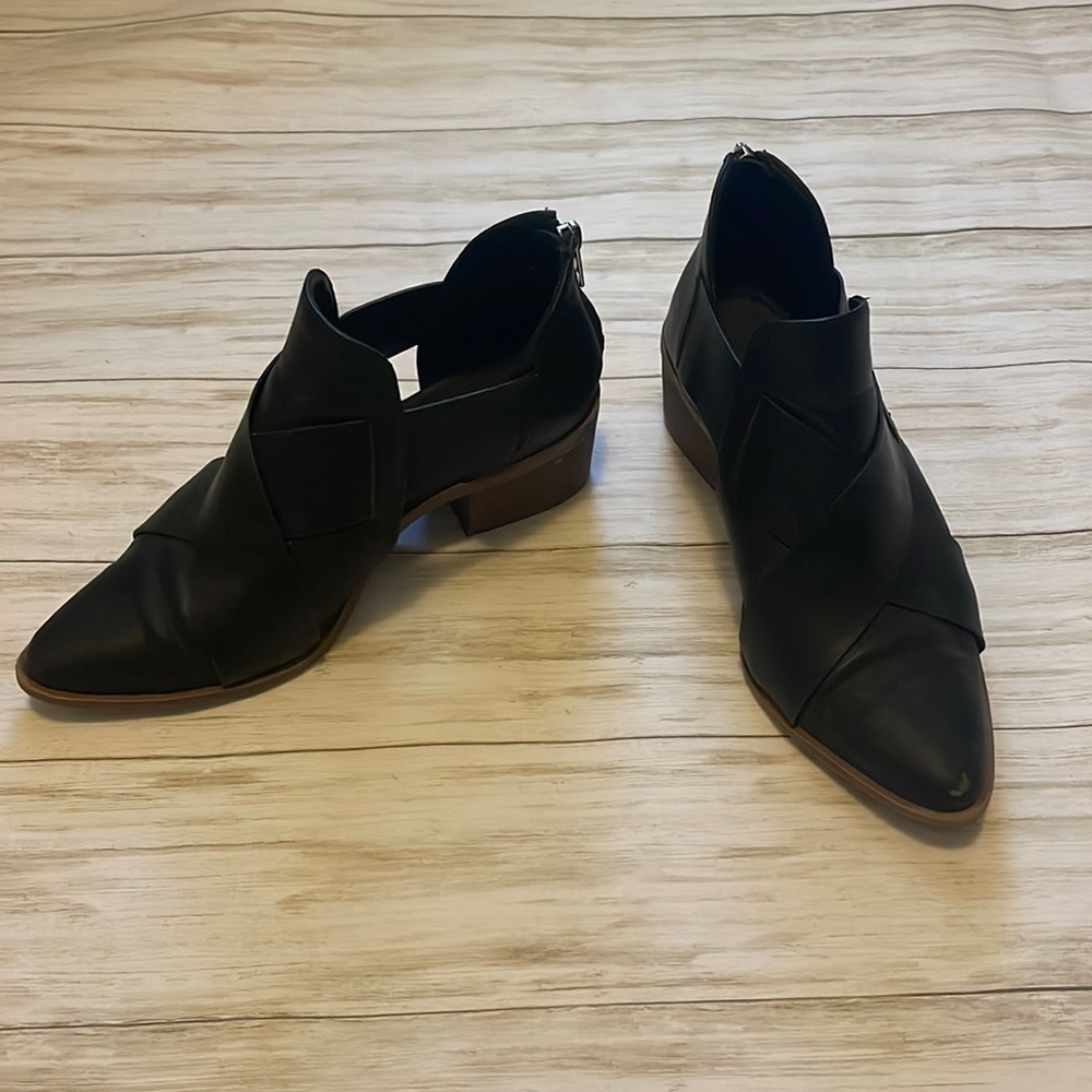 Black booties, zipper in back, size 7